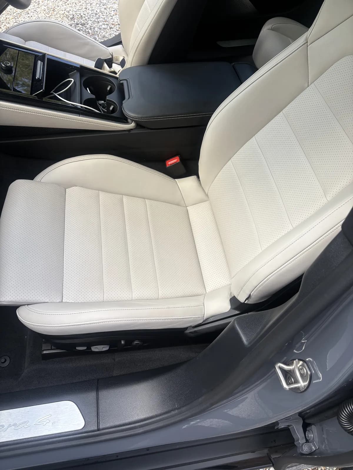 White leather Porsche Panamera driver seat after cleaning