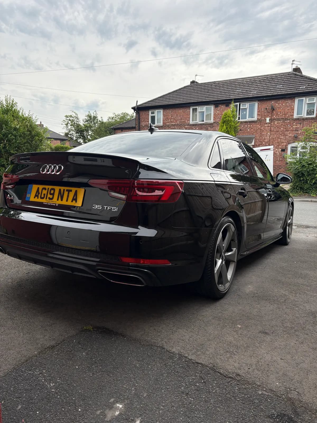 Black Audi saloon viewed from the rear
