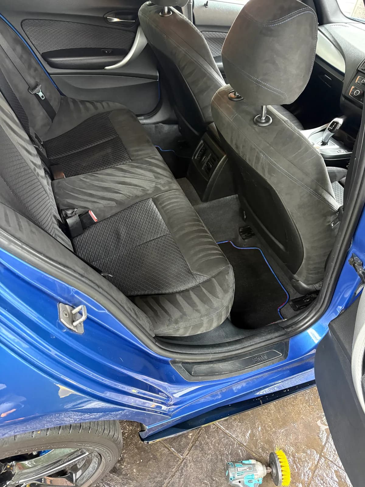 Blue BMW rear seats after interior cleaning