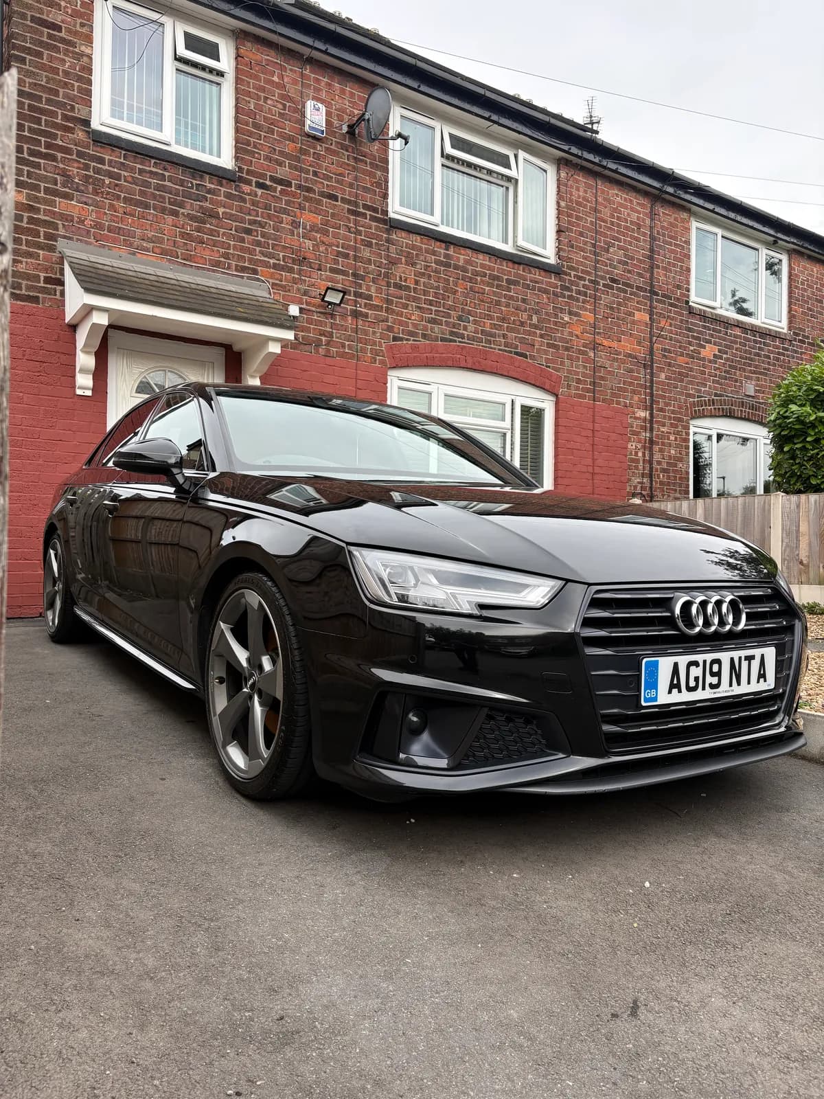 Black Audi saloon viewed from the front